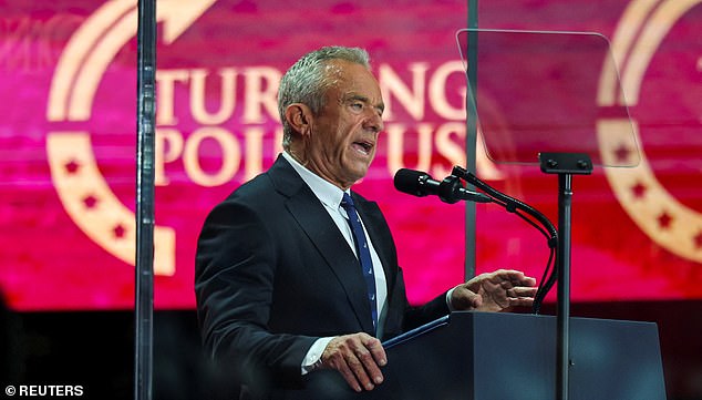 U.S. Health and Human Services Secretary Robert F. Kennedy Jr. speaks during a memorial service for slain conservative commentator Charlie Kirk at State Farm Stadium, in Glendale, Arizona, U.S., September 21, 2025.  REUTERS/Daniel Cole