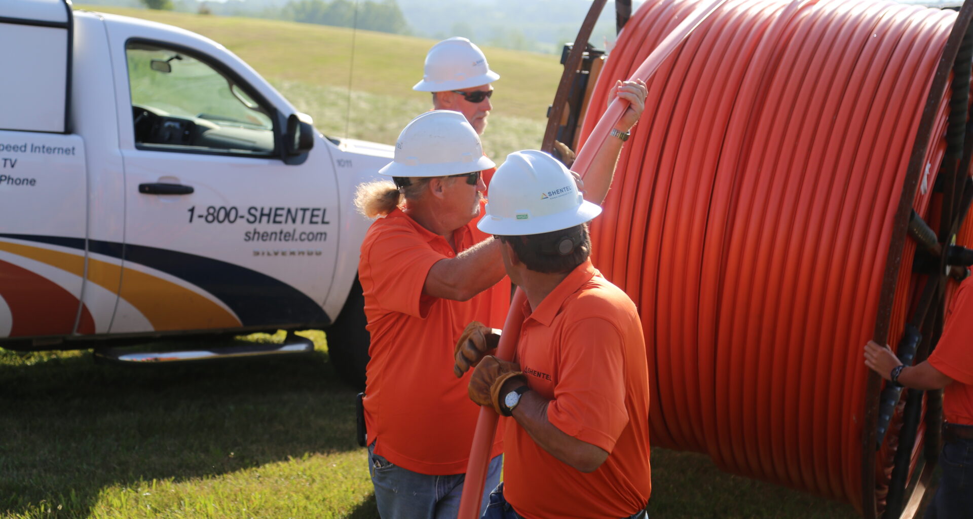 Shentel construction team running reels of new fiber line.