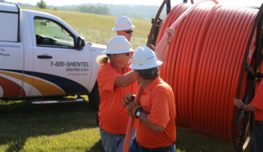 Shentel construction team running reels of new fiber line.