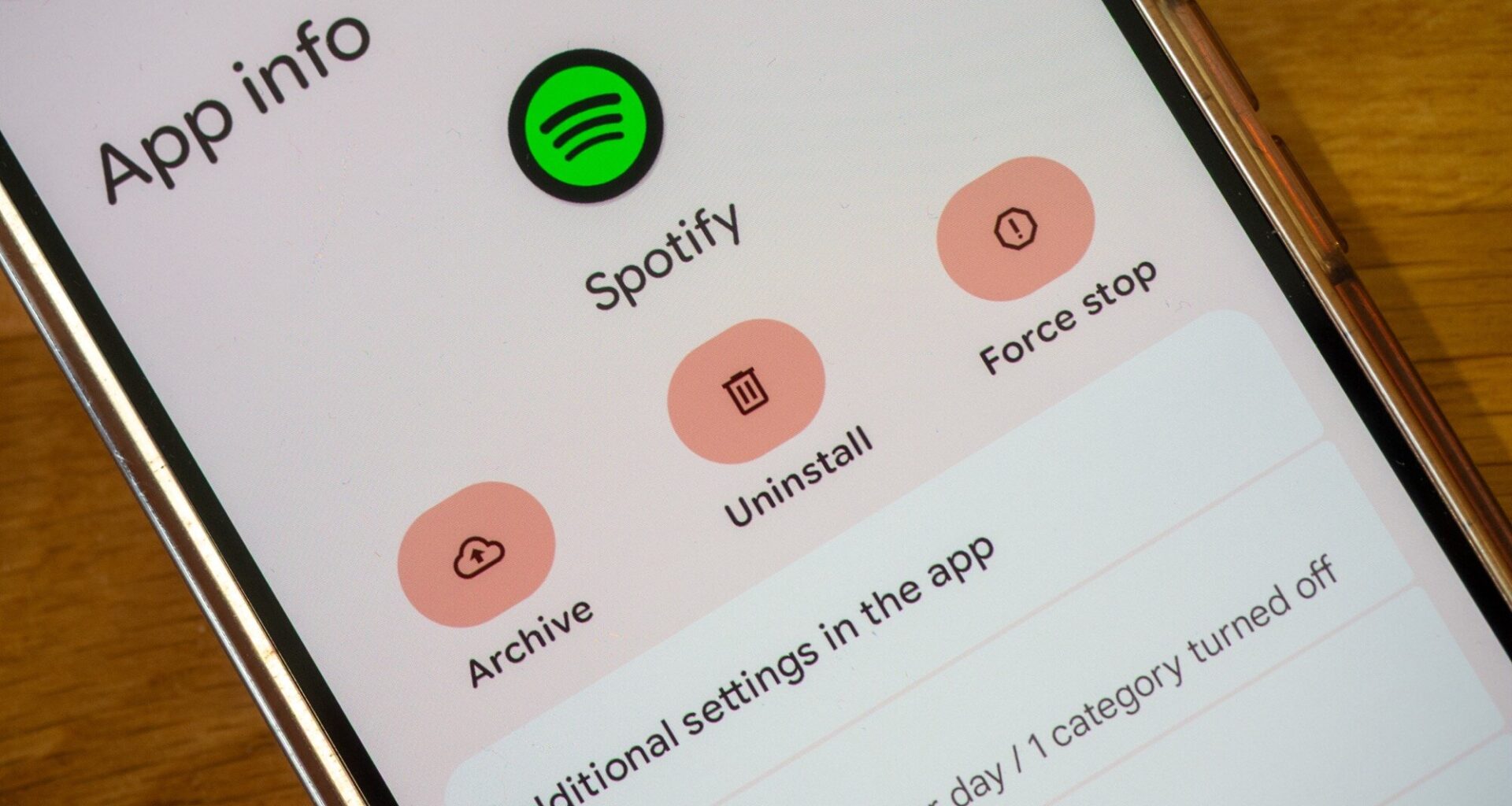 phone showing android app archiving and uninstalling