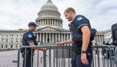 Capitol Police officers adjust security barriers around the East Plaza at the Capitol in Washington, Sept. 24, 2025. (AP)