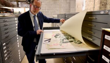 Historical Society of Pennsylvania CEO David Brigham looks at a print