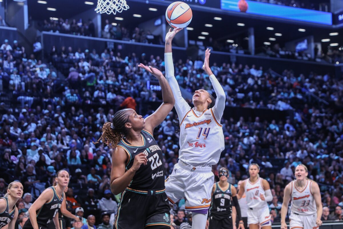 Phoenix Mercury forward DeWanna Bonner (14) shoots over New York Liberty forward Kennedy Burke (22) during game two of round one for the 2025 WNBA Playoffs at Barclays Center.
