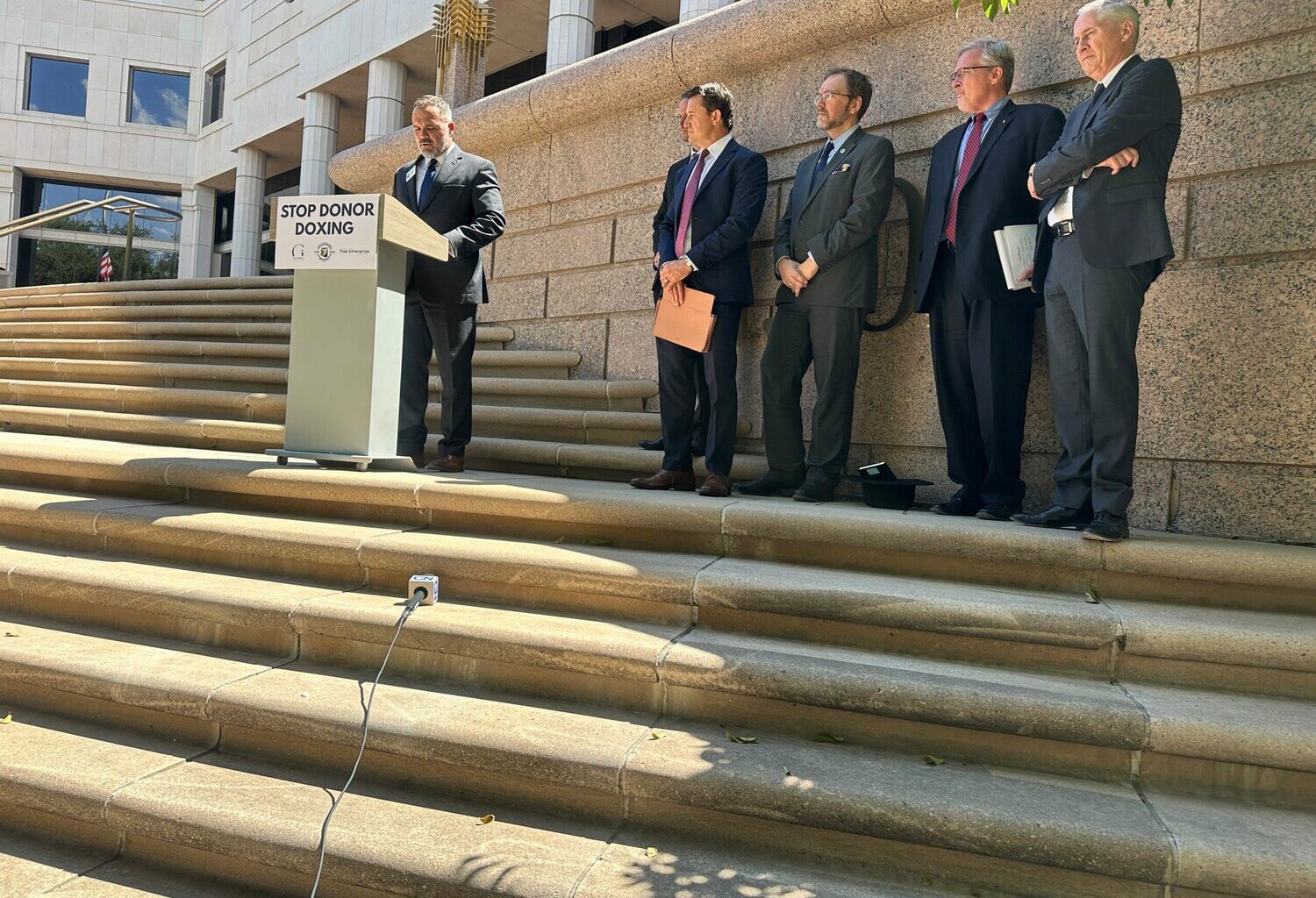Peter Gentala, the president of the Center for Arizona Policy, speaks outside the Arizona Court houses following the oral arguments in the Proposition 211 case on Thursday, Sept. 11, 2025. (Photo by Gabrielle Wallace/Cronkite News)