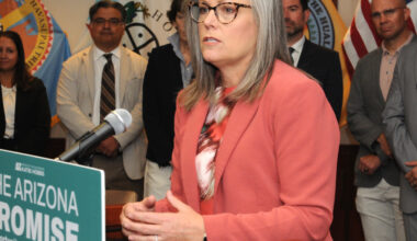 Gov. Katie Hobbs answers questions Monday about her executive order designed to increase available electricity for Arizona for population growth as well as industry — including new data centers and other large users. (Capitol Media Services/Howard Fischer)