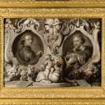 A portrait of two men in a thick gold frame.