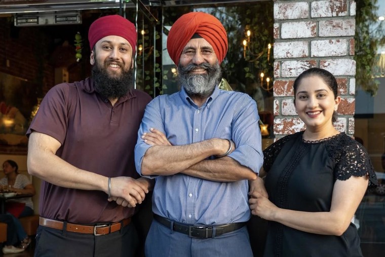 Harsimran Singh, Santokh Singh Khinda and Pawandeep Kaur Khinda outside All India Cafe’s Arcadia, California location.