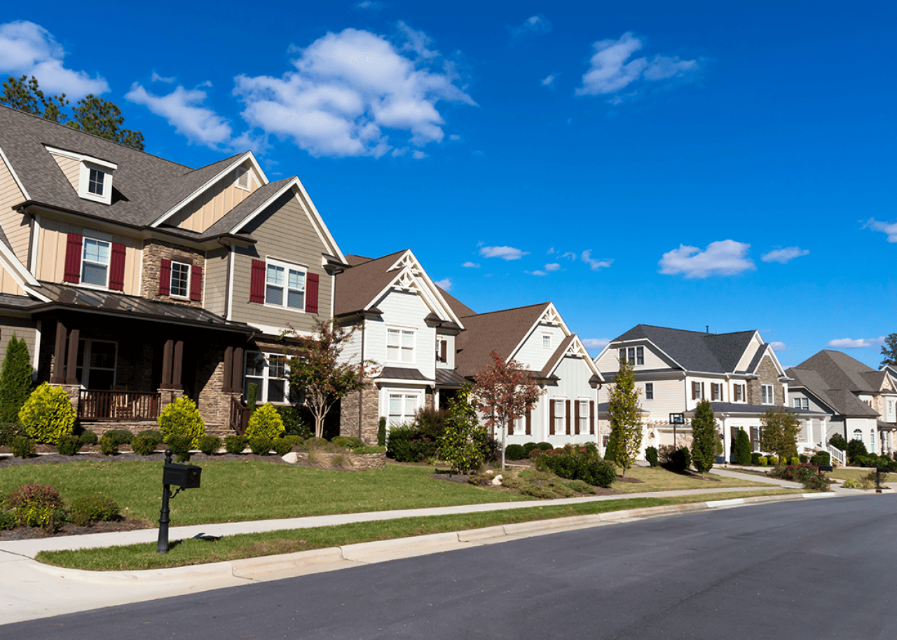 Street of large suburban homes.