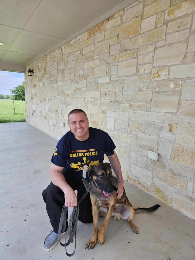 Sr. Cpl. Scott Jay and his dog, Figor, are reunited after the duo were wounded while...