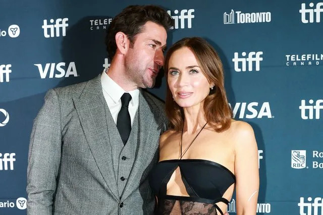COLE BURSTON/AFP via Getty John Krasinski and Emily Blunt