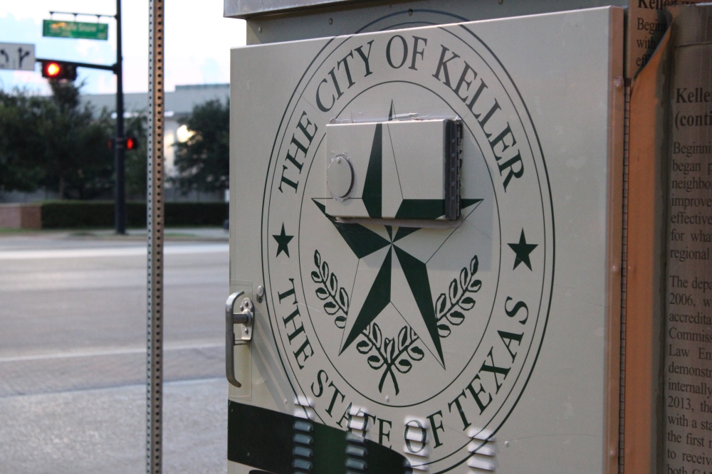 Signage of the City of Keller on a transformer along Keller Town Center.