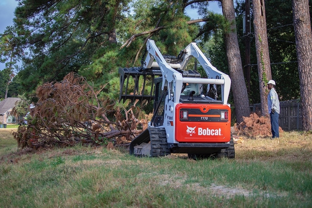 A photo of maintenance being done at a flood district controlled site