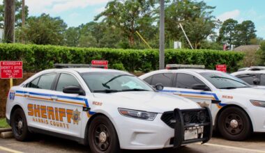 Harris County Sheriff's Office patrol cars parked in parking lot