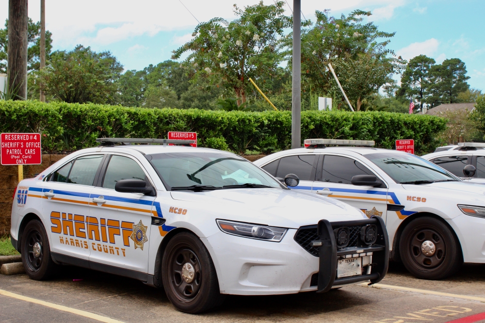 Harris County Sheriff's Office patrol cars parked in parking lot