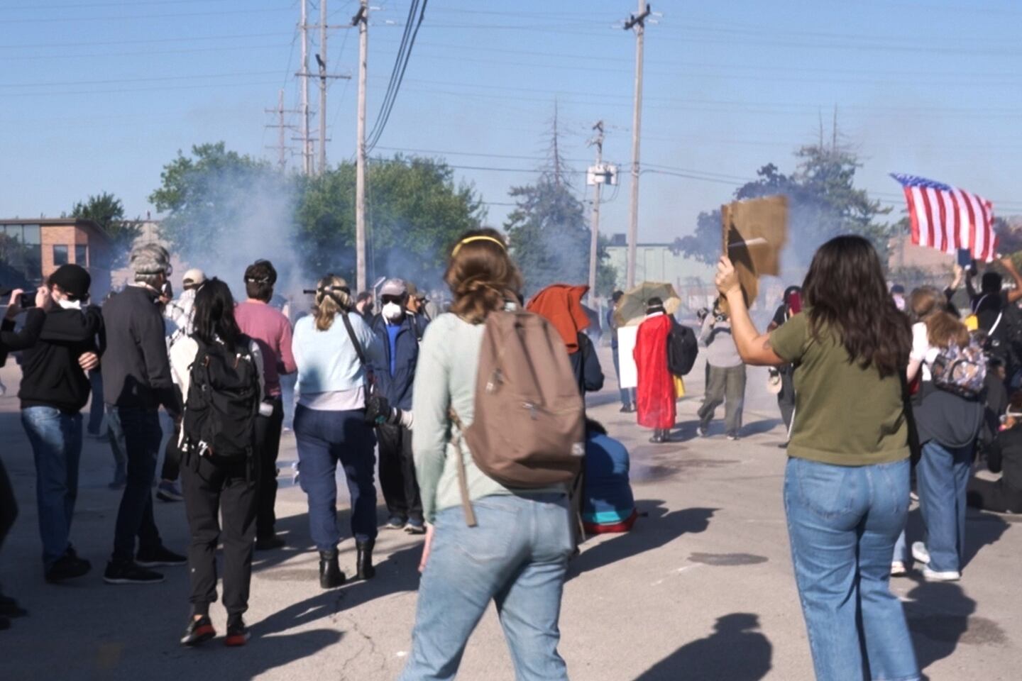 Federal agents fired pepper balls and tear gas at protesters after some people tried to block a car from reaching a federal immigration enforcement building in Broadview, Ill. on Friday, Sept. 26, 2025.