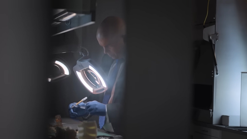 A researcher works with lab equipment to create 3D-printed personalized medical solutions