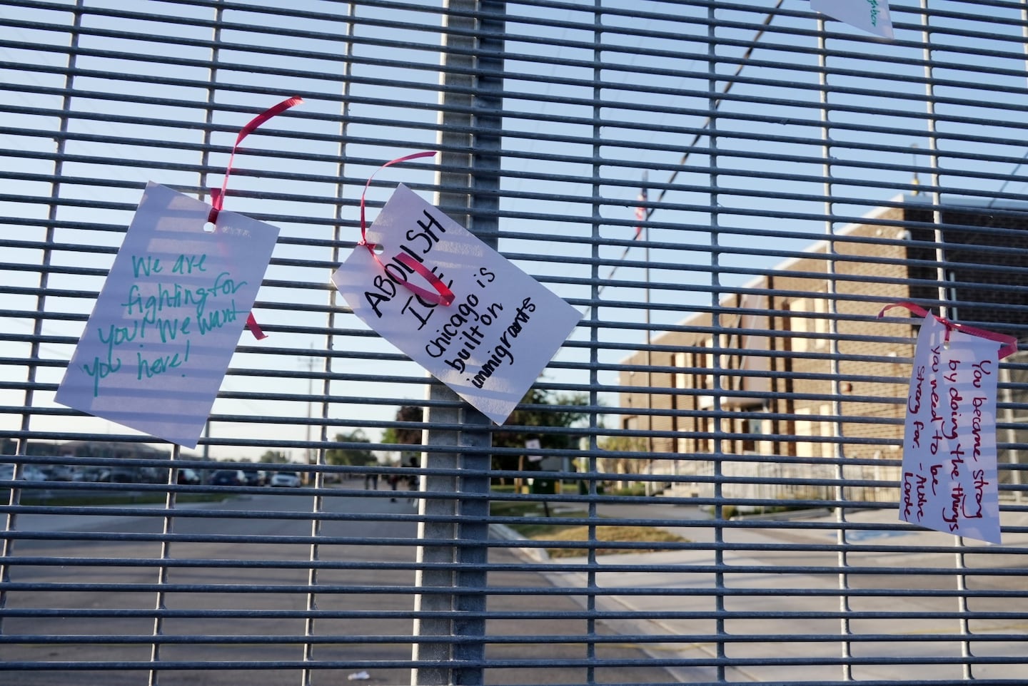 People protest outside a federal immigration enforcement building in Broadview, Ill. on Friday, Sept. 26, 2025.