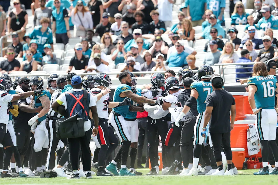 Jacksonville Jaguars and Houston Texans players scufffle along the Jaguars sideline during the second quarter of their game on Sept. 21 at EverBank Stadium in Jacksonville.