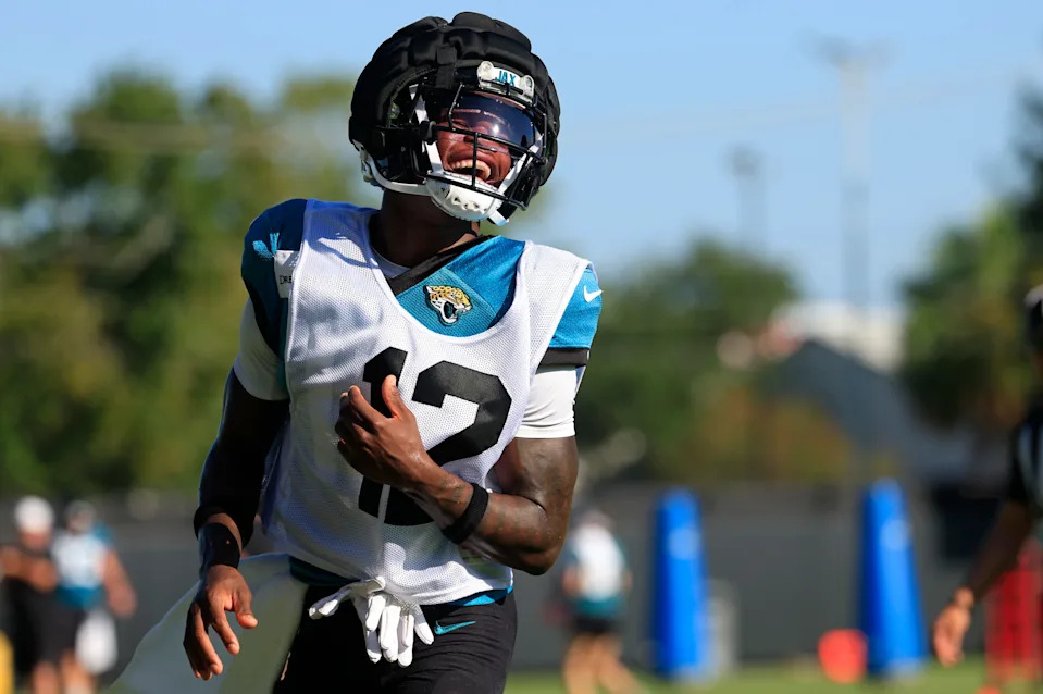 Jacksonville Jaguars wide receiver Travis Hunter (12) reacts during practices as cornerback Jarrian Jones (22) looks on during an NFL training camp session at the Miller Electric Center, Wednesday, Aug. 6, 2025, in Jacksonville, Fla. [Corey Perrine/Florida Times-Union]