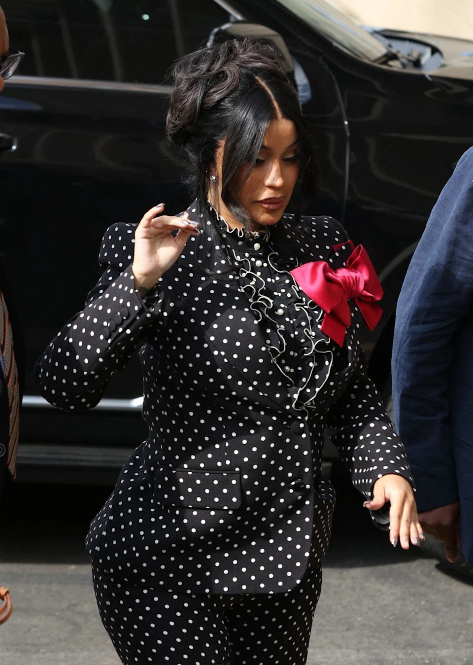 Cardi B wears Polka Dots and a black wig on her fourth day of court appearances