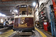 Streetcars "Rosie" (center) and "Petunia" await their next opportunity to hit the streets of...