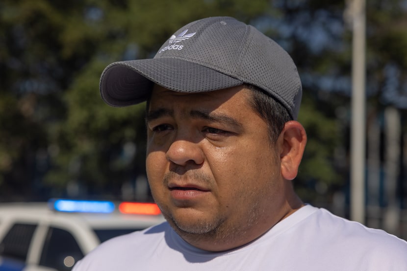 Jonathan García cries while speaking with the News  after being turned away from his...