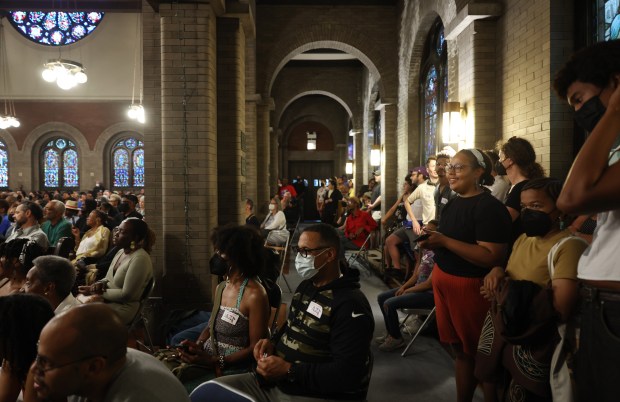 A capacity crowd watches poet Nikki Giovanni and saxophonist Javon Jackson perform at Hyde Park Union Church during the Hyde Park Jazz Festival, Sept. 23, 2023.