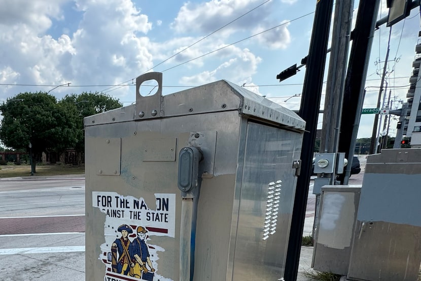 A white-nationalist sticker affixed to a junction box at Colorado and Zang boulevards near...