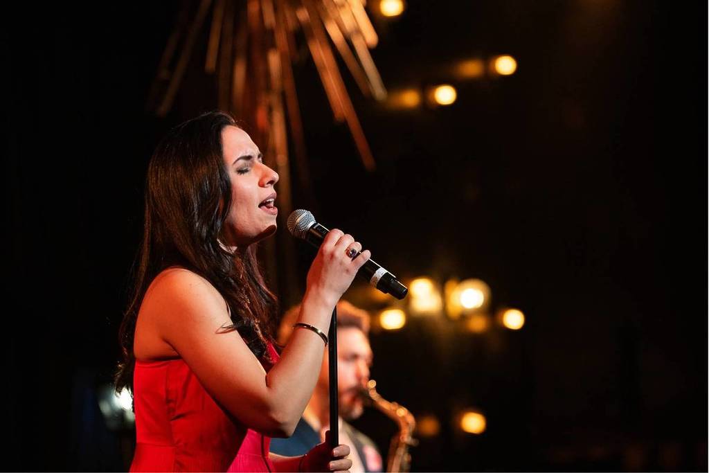 A jazz singer performing live