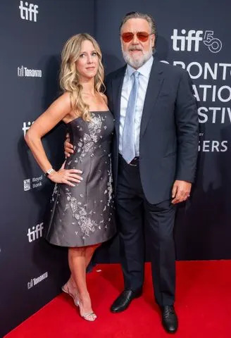 George Pimentel/Shutterstock  Britney Theriot and Russell Crowe