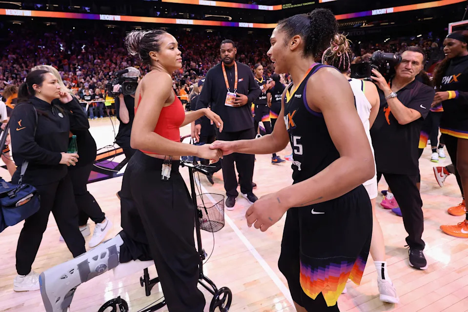 PHOENIX, ARIZONA - SEPTEMBER 28: Napheesa Collier #24 of the Minnesota Lynx congratulates Alyssa Thomas #25 of the Phoenix Mercury following Game Four of the 2025 WNBA Playoffs semifinals at PHX Arena on September 28, 2025 in Phoenix, Arizona. The Mercury defeated the Lynx 86-81 to advance to the WNBA finals. NOTE TO USER: User expressly acknowledges and agrees that, by downloading and or using this photograph, User is consenting to the terms and conditions of the Getty Images License Agreement. (Photo by Christian Petersen/Getty Images)