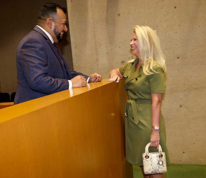 Sarah Dodd talks with Mayor Pro Tem Jesse Moreno at Dallas City Hall, Wednesday, Aug. 6,...