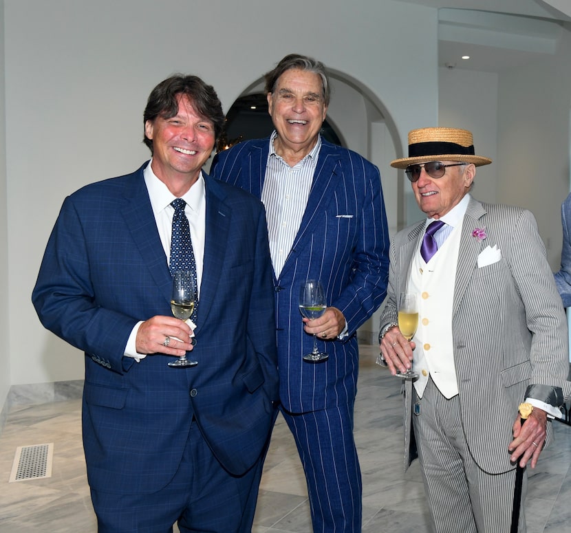 Hanging with the boys, from left: Blair Pogue, broker Douglas Newby and real estate attorney...