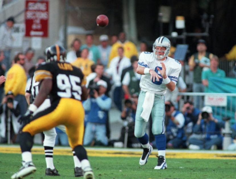Troy Aikman (8) throws the ball past Pittsburgh defender Gregg Lloyd.