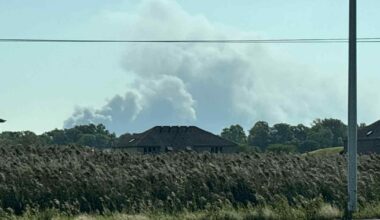 Large auto lot fire burning in Chicago Heights, Illinois