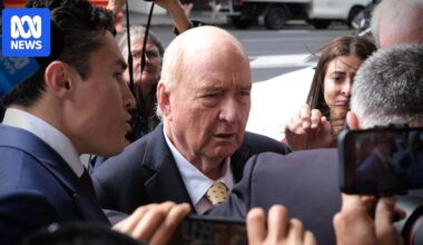 Charges against veteran broadcaster Alan Jones 'downgraded', some withdrawn