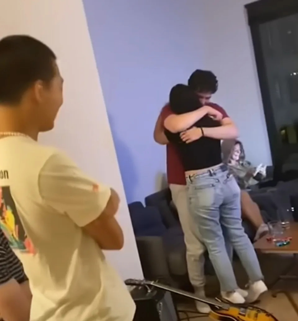 Two people hugging