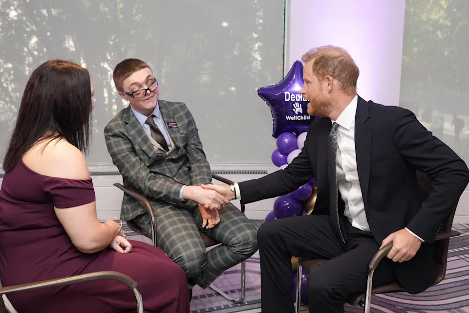Britain's Prince Harry, Duke of Sussex (R) speaks with Declan Bitmead (C), recipient of the Inspirational Young Person 15-18 award, at the annual WellChild Awards in London on September 8, 2025. WellChild is the national charity for seriously ill children and their families. The WellChild Awards celebrate the inspiring qualities of some of the country's seriously ill young people and the dedication of those who care for and support them. (Photo by Aaron Chown / POOL / AFP) (Photo by AARON CHOWN/POOL/AFP via Getty Images)          