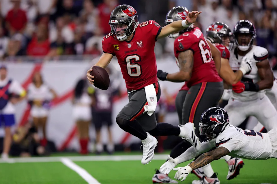 HOUSTON, TEXAS - SEPTEMBER 15: Baker Mayfield #6 of the Tampa Bay Buccaneers runs the ball against the Houston Texans during the fourth quarter in the game at NRG Stadium on September 15, 2025 in Houston, Texas. (Photo by Alex Slitz/Getty Images)