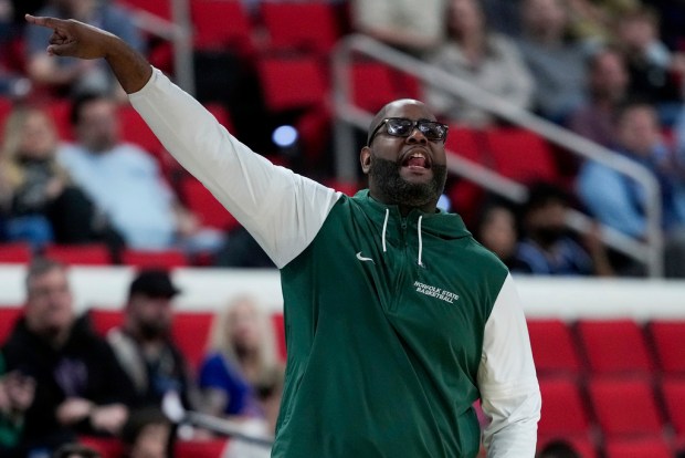 Norfolk State head coach Robert Jones directs during the first half in the first round of the NCAA college basketball tournament against Florida, Friday, March 21, 2025, in Raleigh, N.C. (AP Photo/Stephanie Scarbrough)
