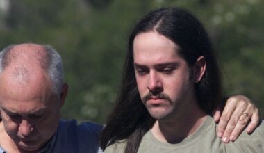 Jimmy Welborn, left, escorts his son Forrest away from the Travis County Jail on Friday, Dec. 10, 1999, in Austin, Texas. (AP Photo/Harry Cabluck)