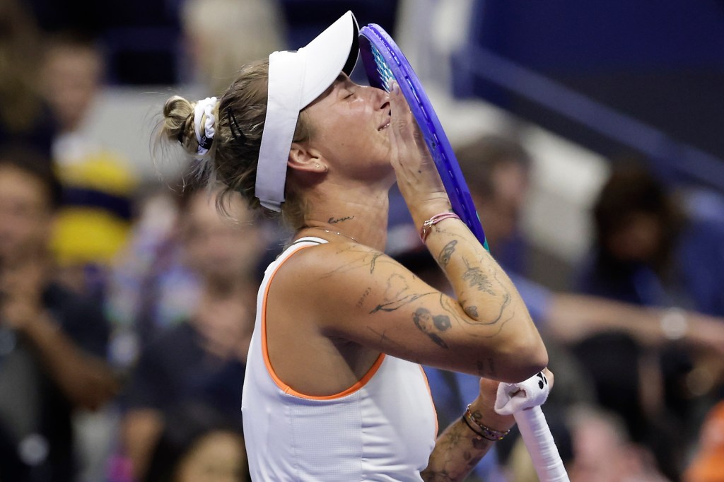 Marketa Vondrousova, of the Czech Republic, reacts after defeating Elena Rybakina, of Kazakhstan, during the fourth round of the US Open tennis championships, Sunday, Aug. 31, 2025, in New York. 