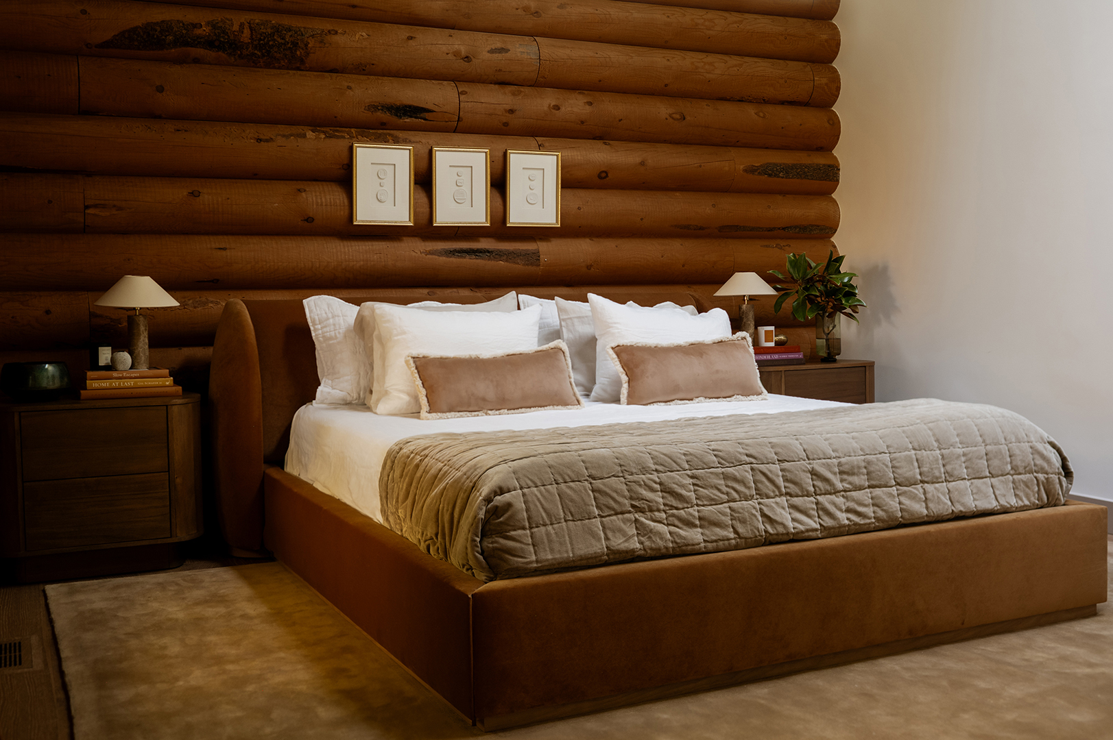 Bedroom with burnt orange bed 