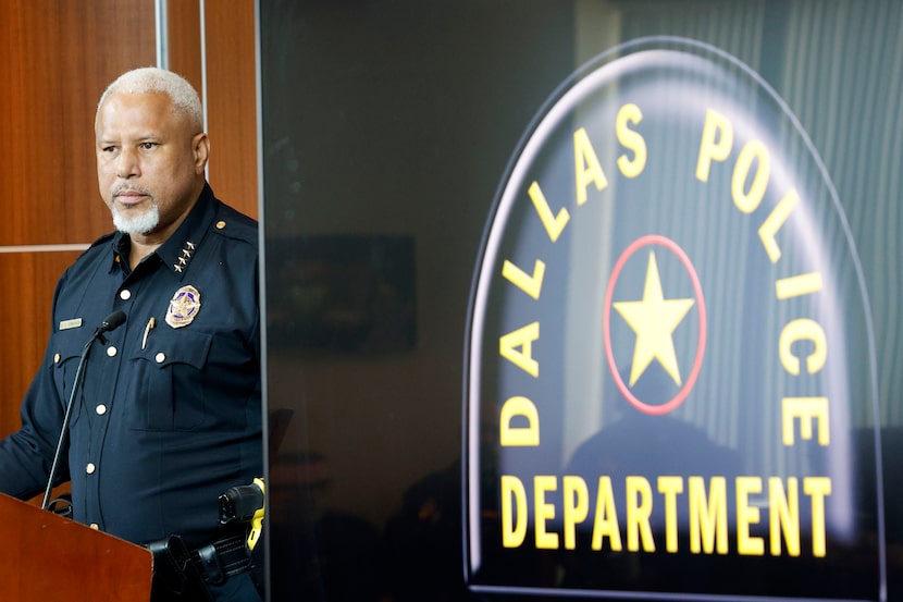 Dallas Police Chief Daniel Comeaux listens a reporter’s question during a news conference at...