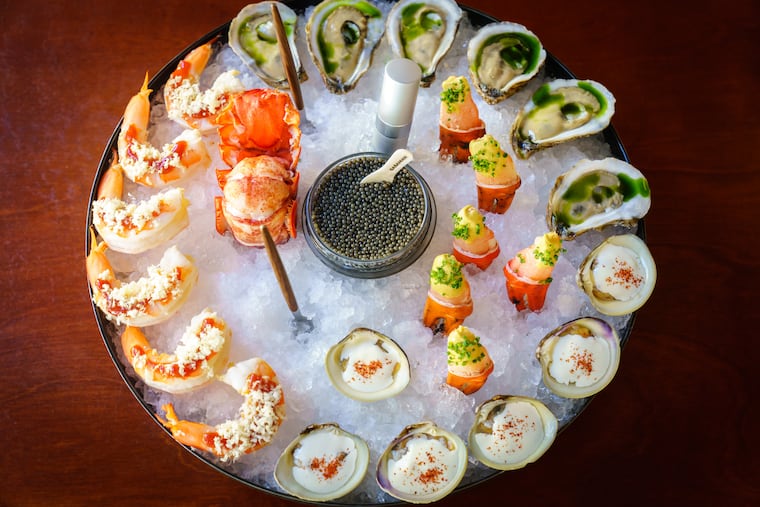 The Grande Plateau, a collection of raw and chilled seafood, including Sweet Amalia Oysters, Jersey Dug Clams, Royal Red Shrimp Cocktail, Scarlet Crab Claws, Chilled Lobster, and Vineyard Bay Scallops. at Little Water, a new Rittenhouse restaurant, in Philadelphia, October 8, 2024.