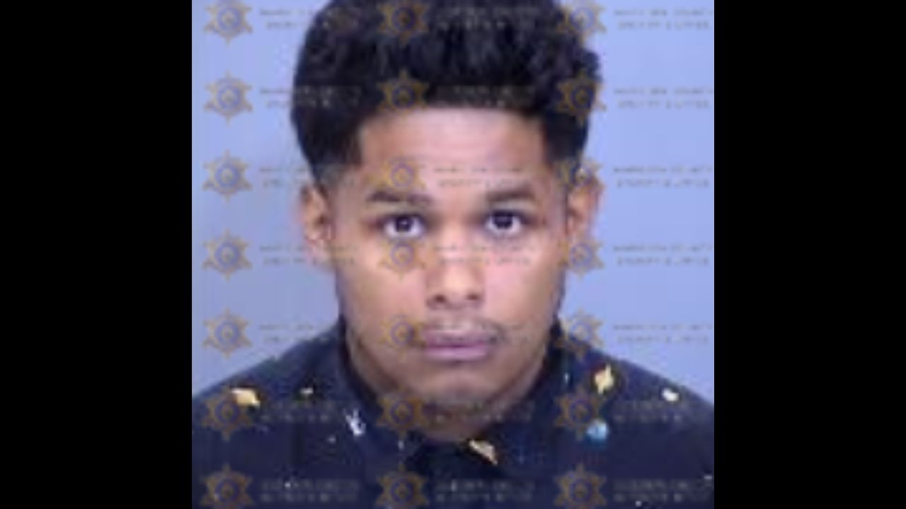 A suspect was arrested in connection with the decomposing body of a man that was found near the Gra...
