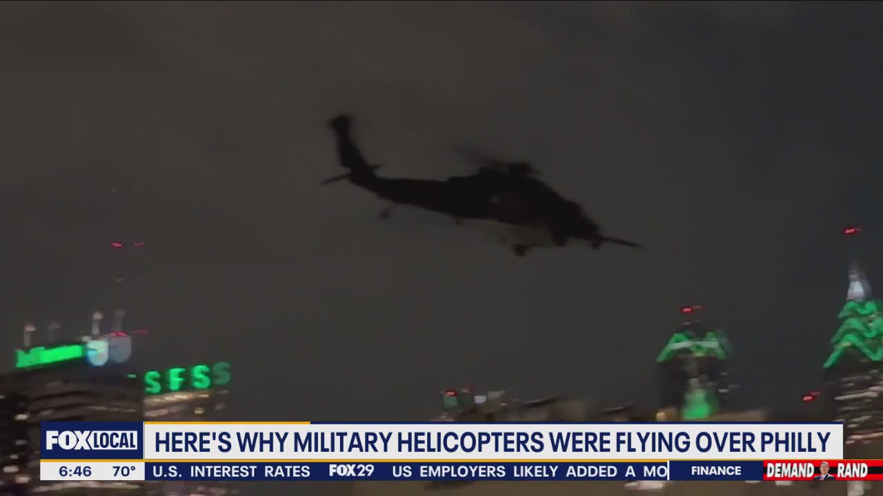 Why were military helicopters flying over Philadelphia on Thursday night?
