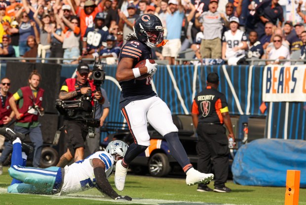Chicago Bears wide receiver Luther Burden III (10) catches a...