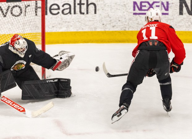Blackhawks' Oliver Moore shoots on goal during practice at the Fifth Third Arena on Sept. 10, 2025. (Dominic Di Palermo/ Chicago Tribune)