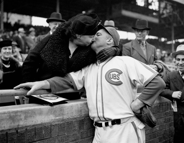 Ann Hartnett, mother of Gabby Hartnett, manager of the Chicago Cubs, was on hand Oct. 5, 1938 for the first game of the World Series in Chicago against the Yankees, and she indicated what team she wanted to win when she gave Gabby this great big kiss. (AP)